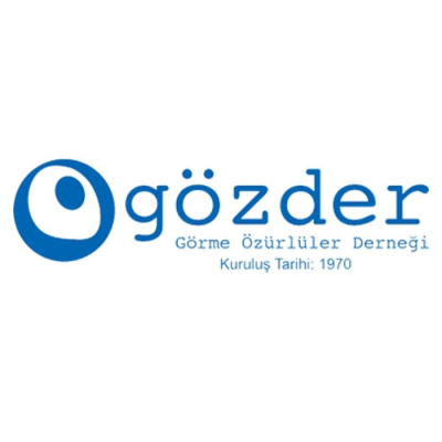 GÖZDER Gözder Görme Özürlüler Derneği logosu. Nazar boncuğunu andıran mavi bir göz amblemi ve yanında dernek adı ile 1970 kuruluş yılı ibaresinden oluşuyor.